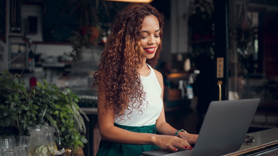 Female business owner doing online marketing.