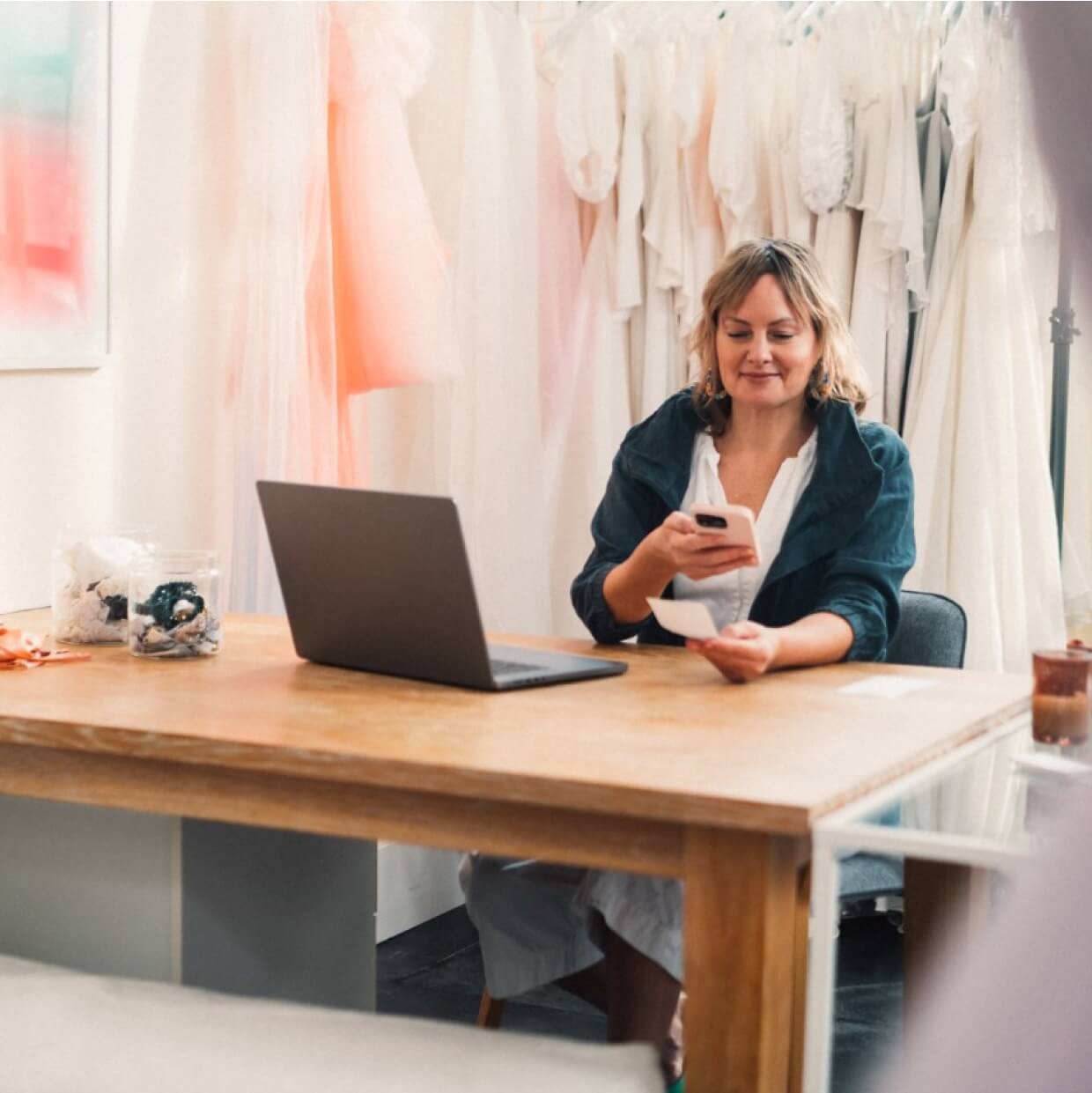Professional business owner using QuickBooks mobile app to scan expense receipt