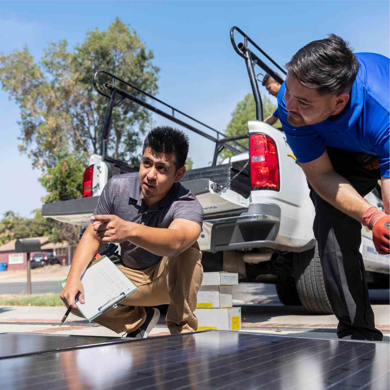 Field services business owner talking with an employee